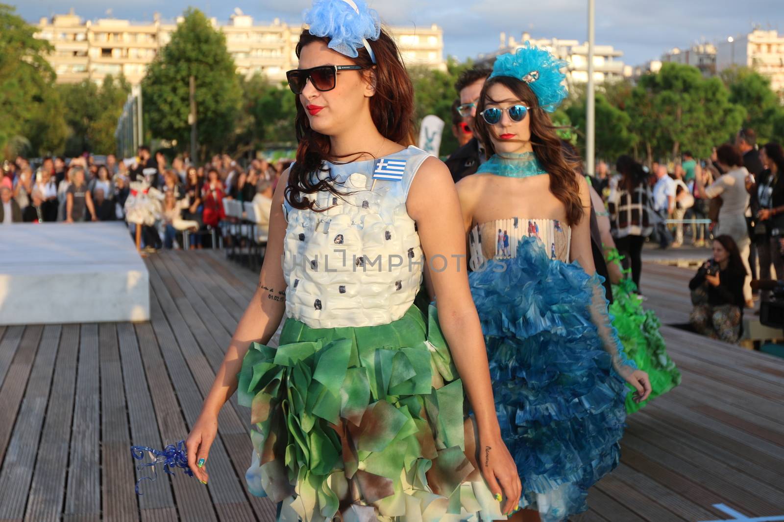 GREECE, Thessaloniki: A quirky outdoor fashion show with clothing made of recycled materials was held on the seafront promenade of Thessaloniki, northern Greece on September 28, 2015.	Professional designers, amateurs, fashionistas, architects and artists inspired by the city, the sea, the sky, the light and the colors of the New Promenade made unique creations from worthless items and recycled fabrics.