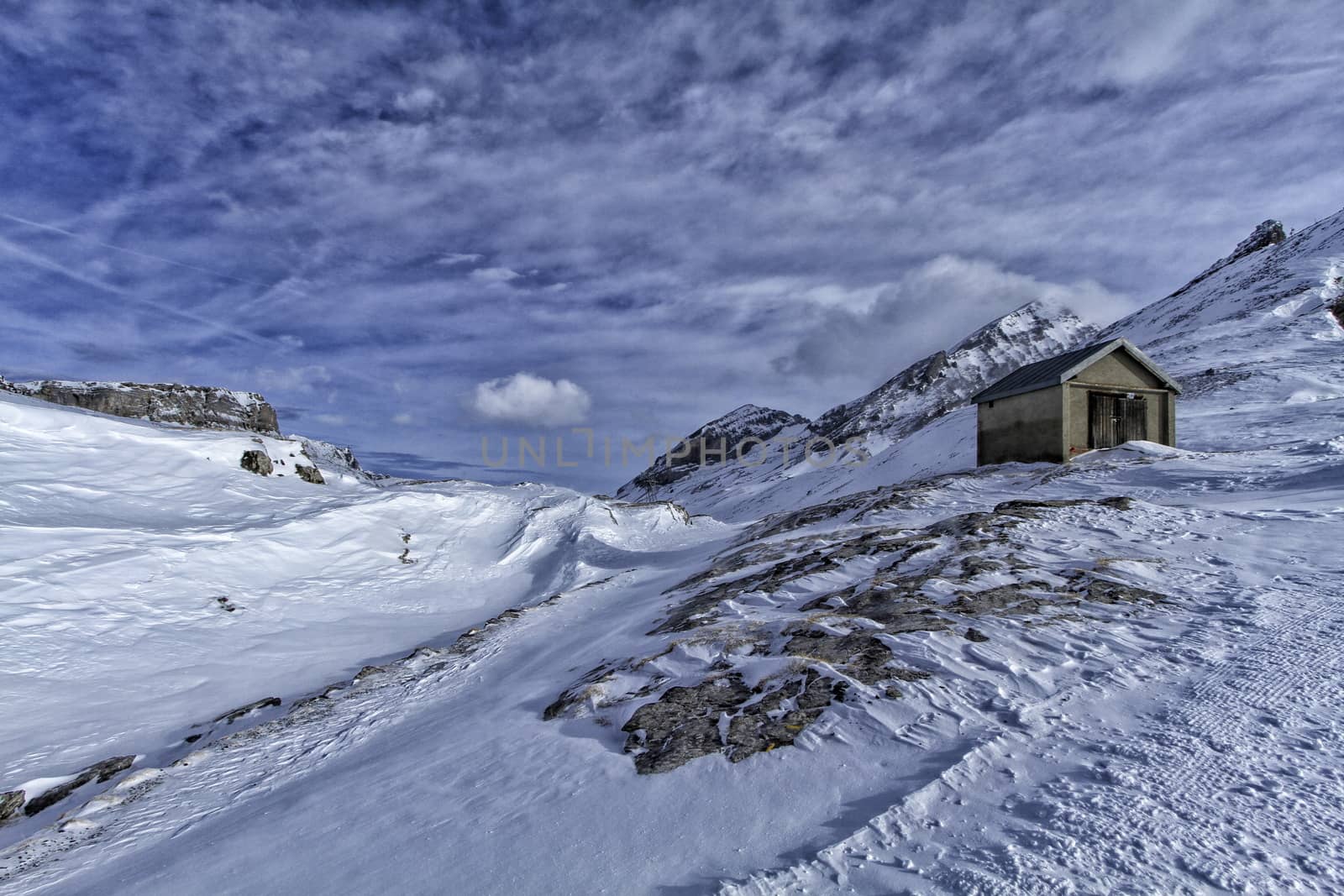 Landscape of mountain with some snow and a blue sky