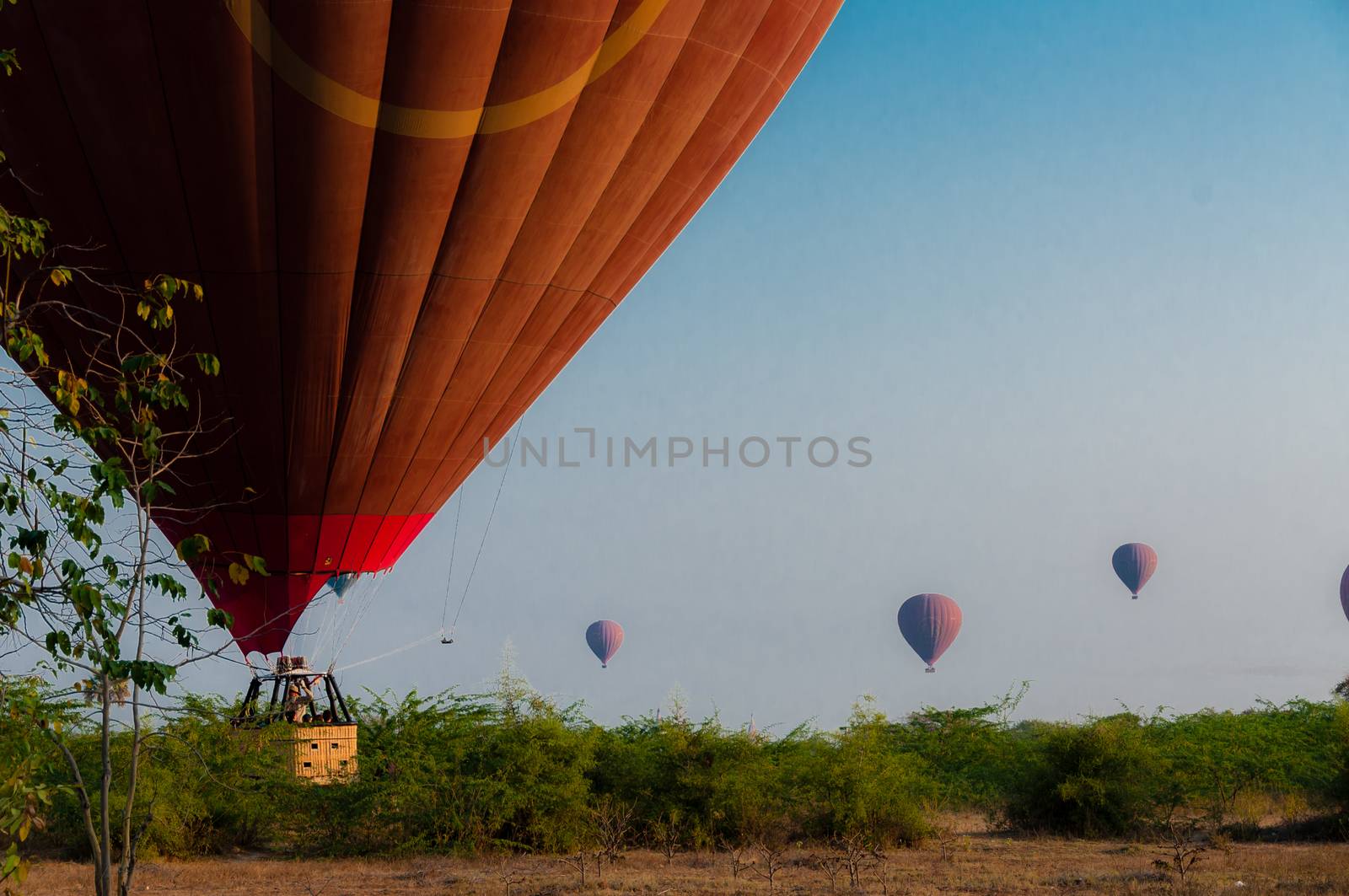 Hot air balloon landing in Bagan Myanmar by attiarndt