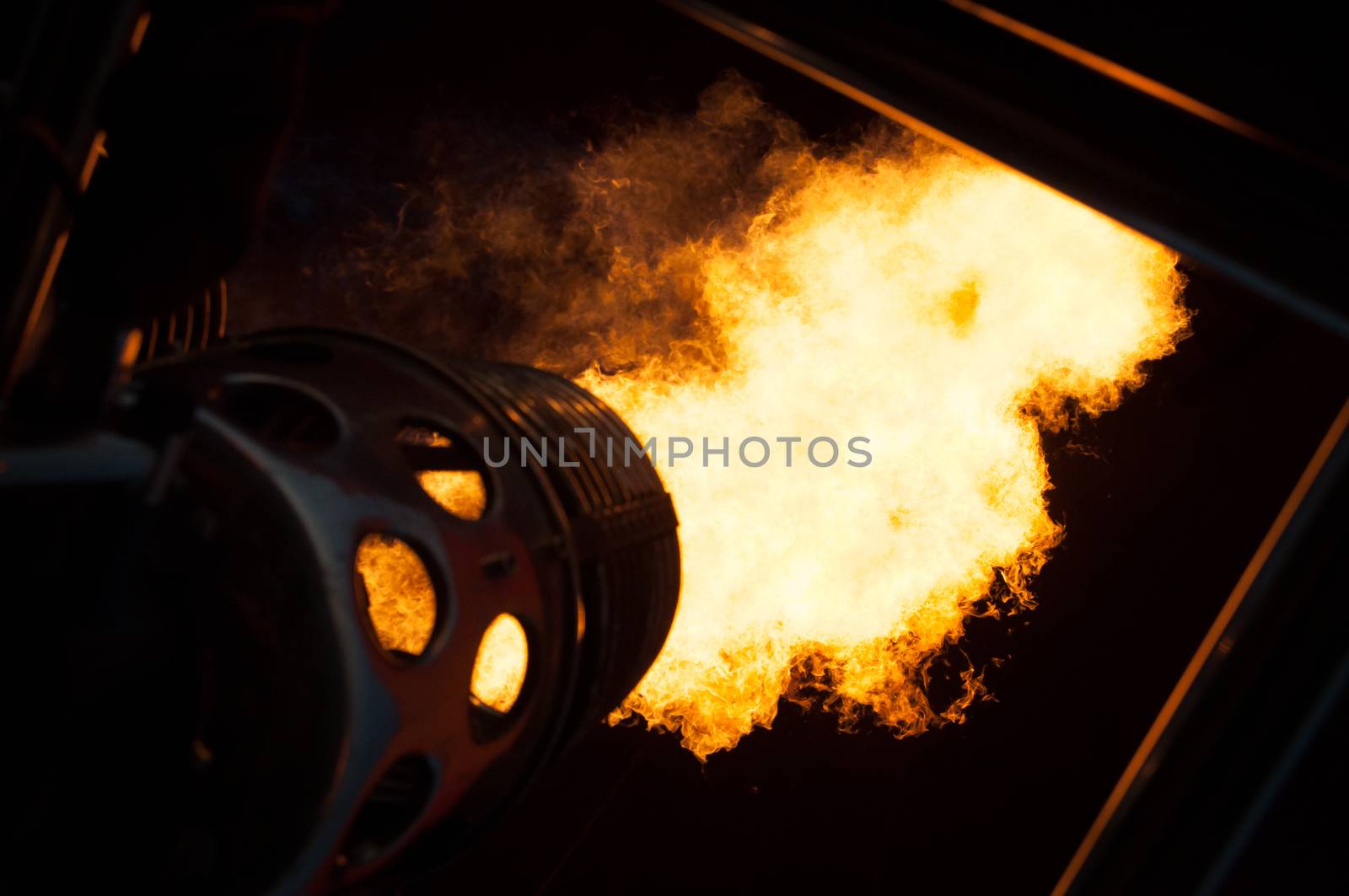 Flames detail  in the night to heat up a hot air balloon.