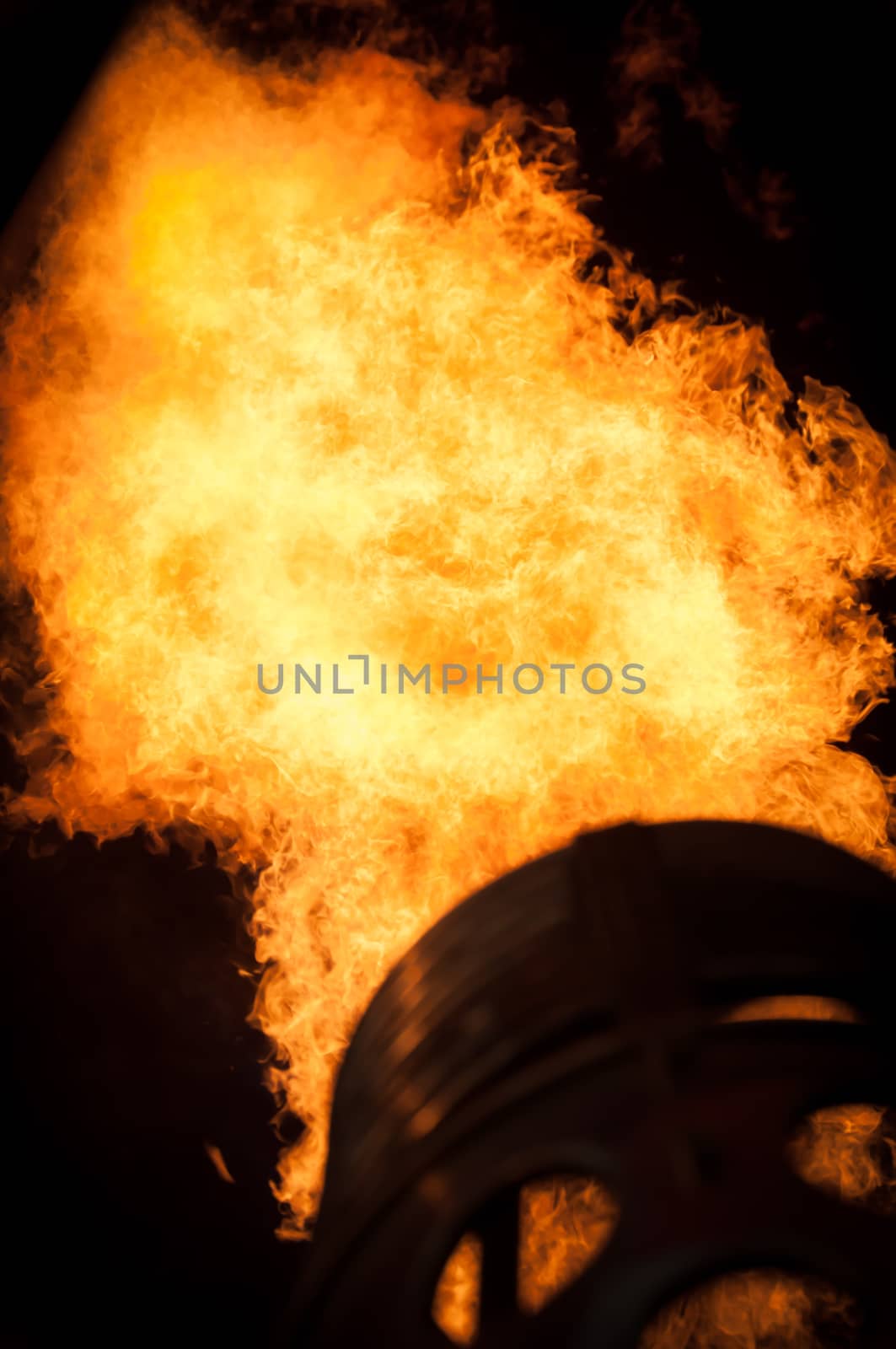 Flames detail  in the night to heat up a hot air balloon.