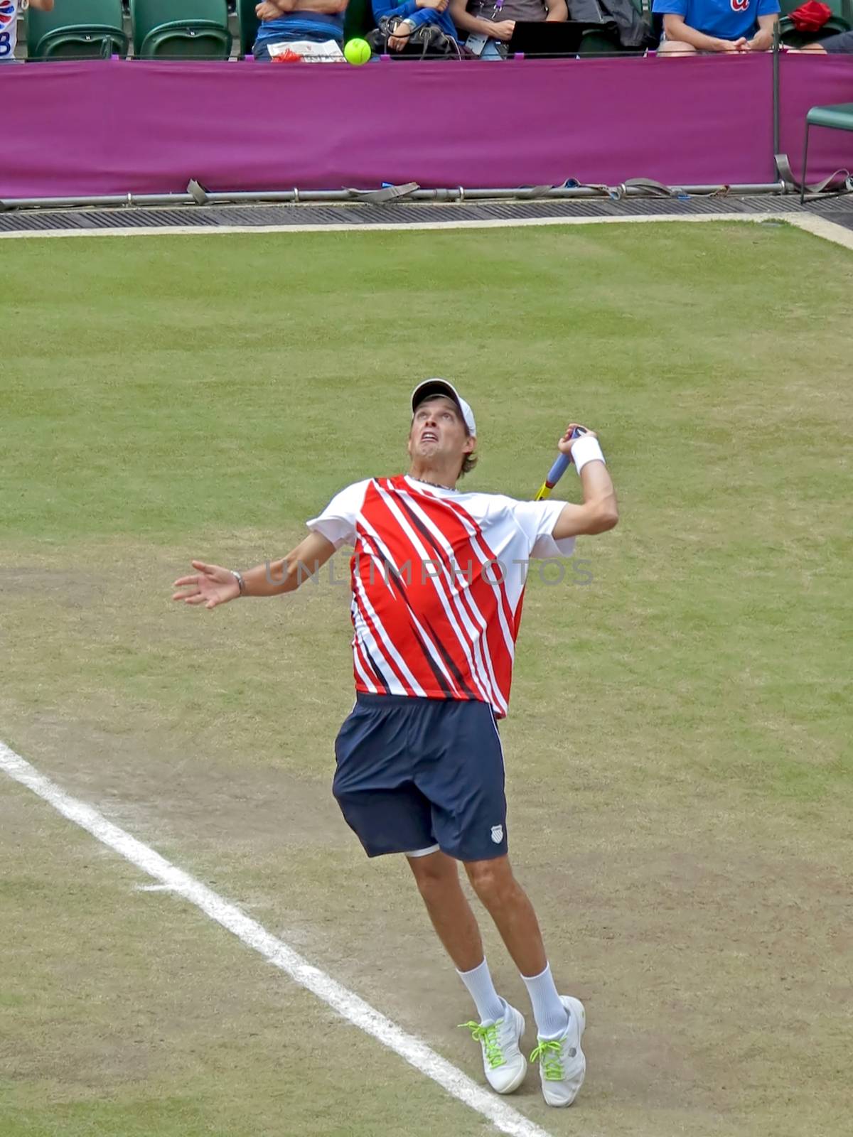 WIMBLEDON, ENGLAND - August 2nd, 2012 - Mike Bryan during one of his double matches at the summer Olympics in London in 2012. They went on to win the gold medal