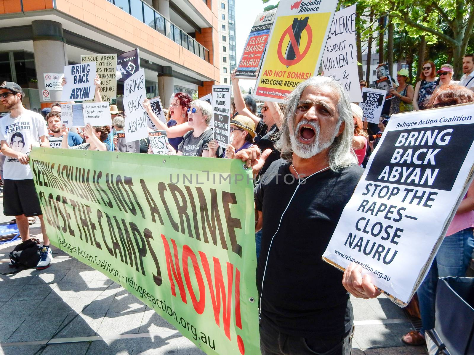 AUSTRALIA, Sydney: Supporters of a Somalian refugee, known as Abyan, have protested outside the Department of Immigration in Sydney on October 19, 2015 after she was taken back to Nauru last week. The woman, who was allegedly raped, was flown to Australia to have an abortion but was returned to Nauru by a chartered jet on Friday, without having had an abortion. 