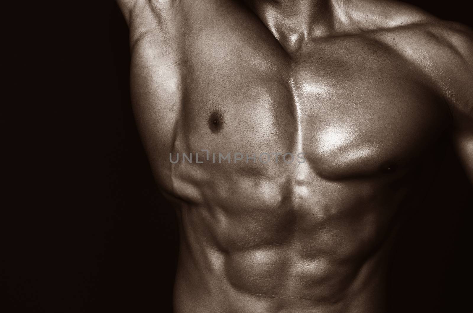 Body of muscular man. Horizontal studio shot