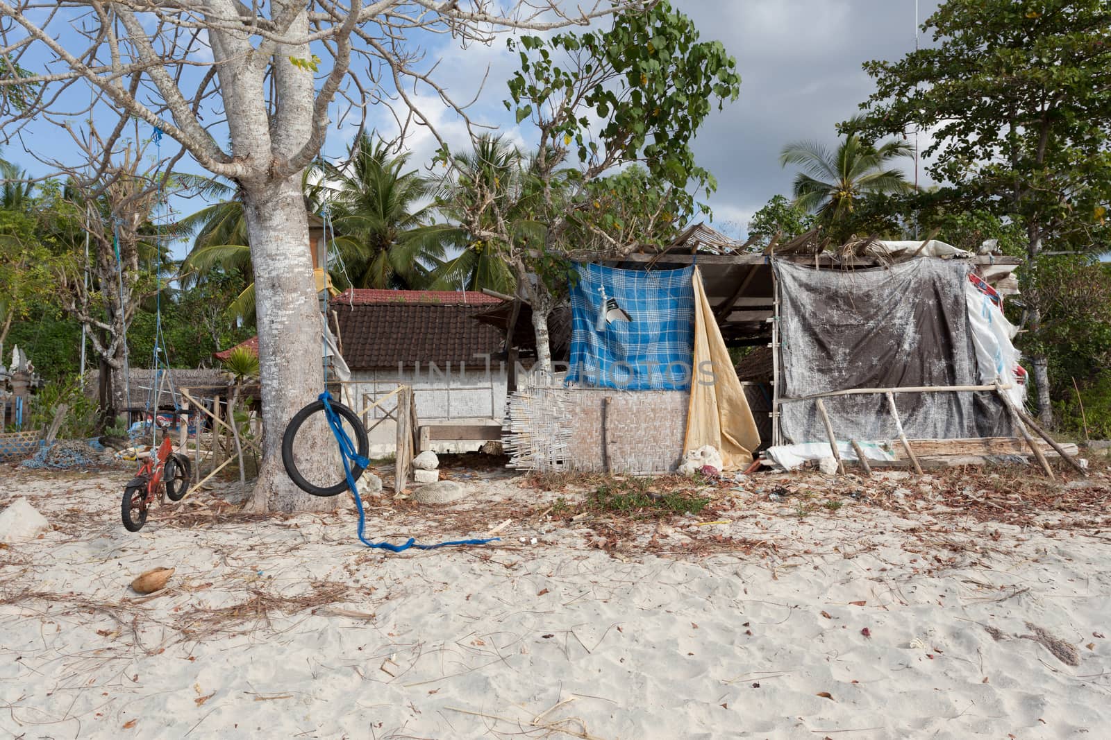 poor huts of the natives, traditional indonesian poor house - shack on beach, Nusa Penida Island, Toyapakeh. Bali.