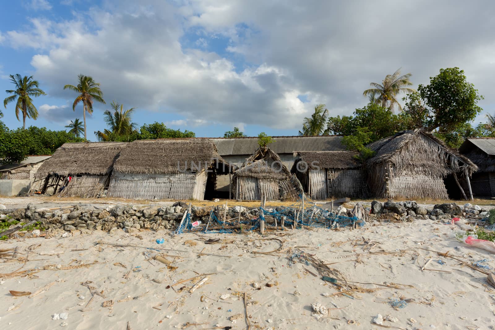 poor huts of the natives, traditional indonesian poor house - shack on beach, Nusa Penida Island, Toyapakeh. Bali.