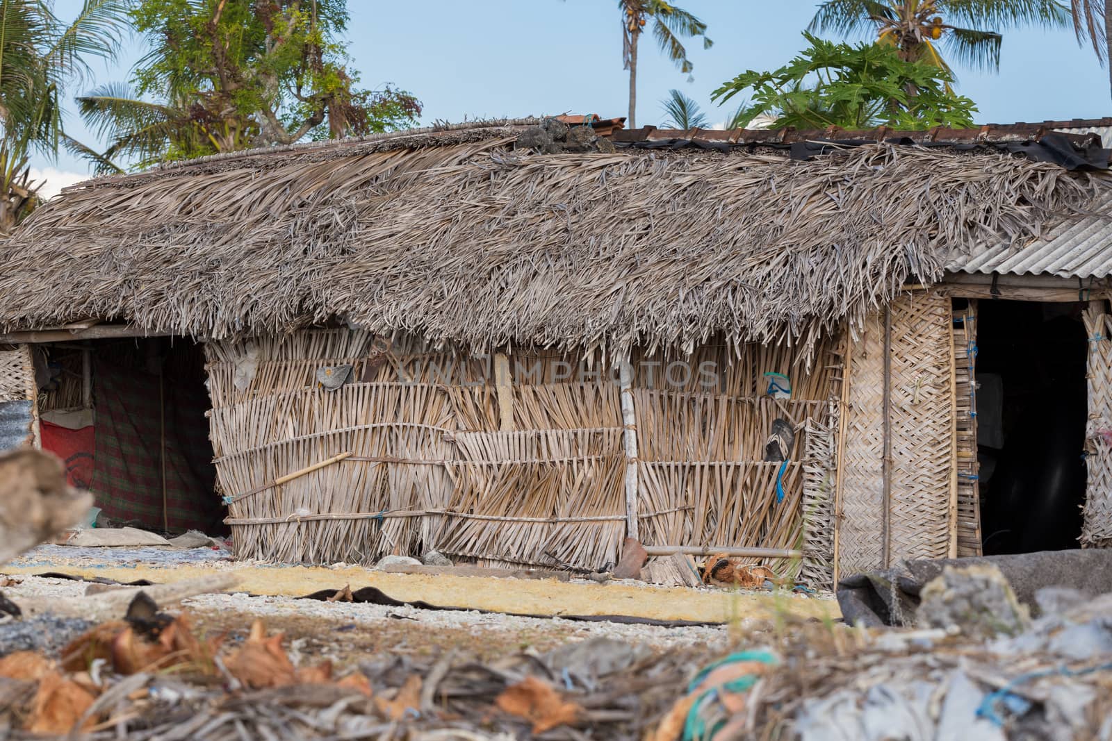 poor huts of the natives, traditional indonesian poor house - shack on beach, Nusa Penida Island, Toyapakeh. Bali.