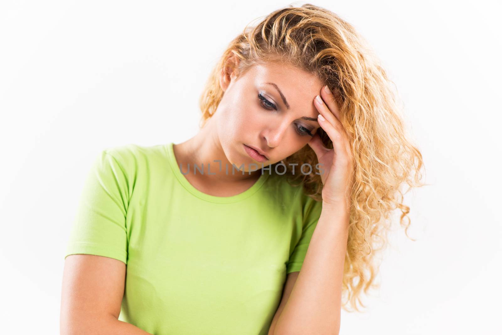 Portrait of young Exhausted woman stressing and keep hand on head. White background.
