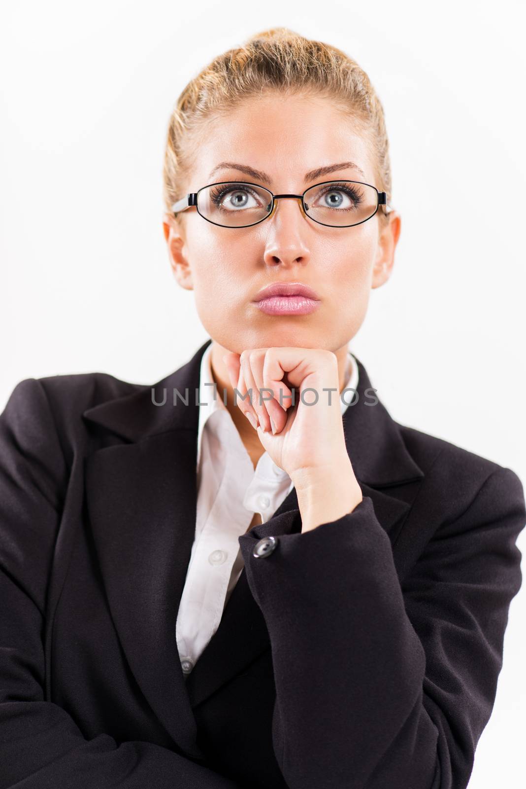 Portrait of attractive businesswoman thinking.