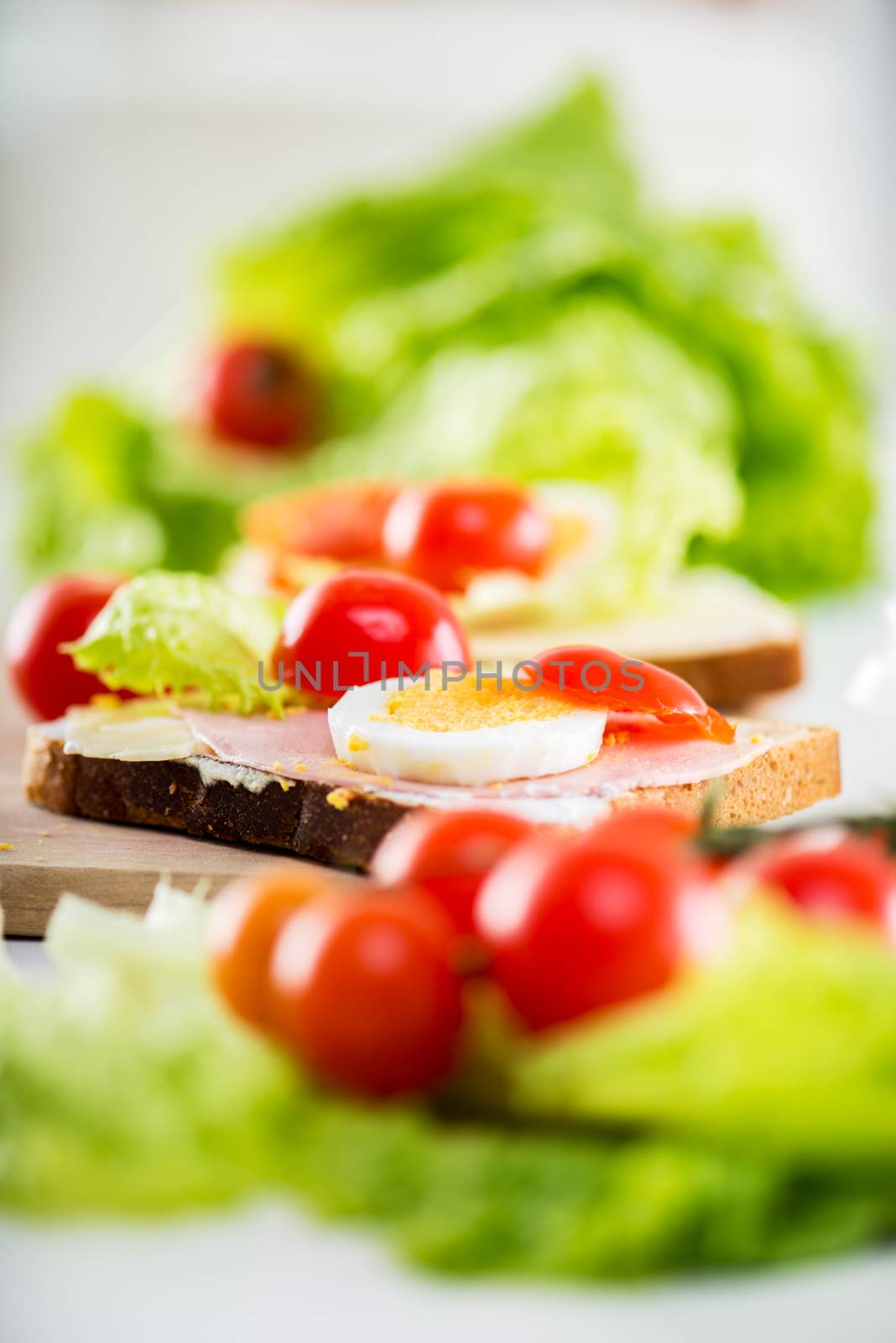 Fresh sandwich with cherry tomato and eggs.