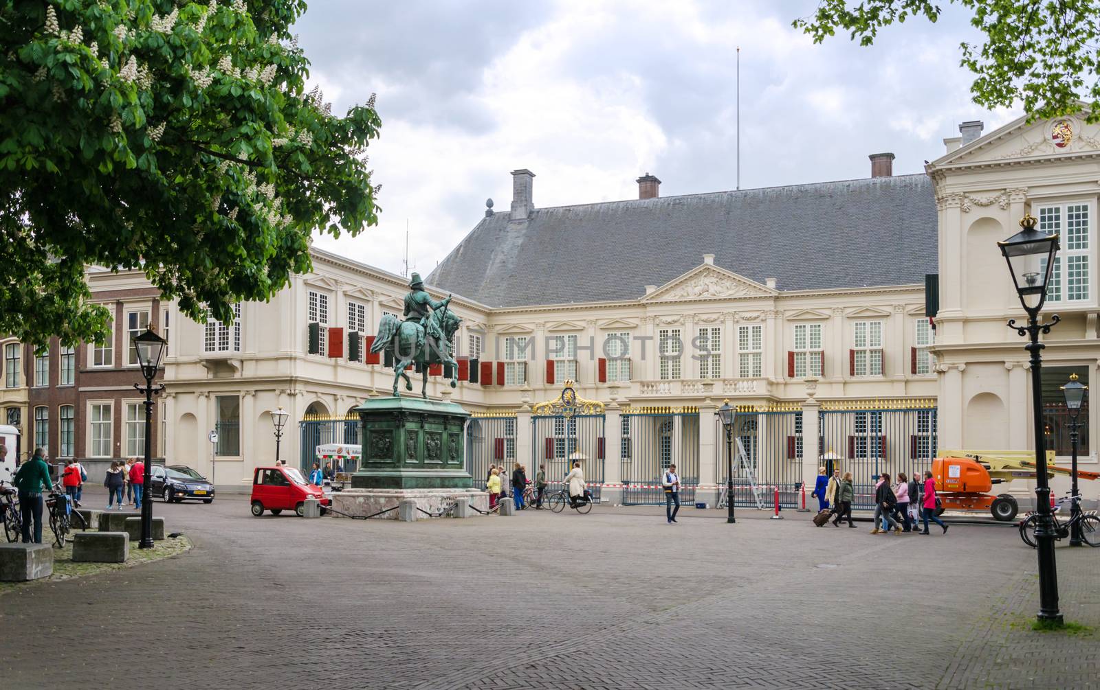 The Hague, Netherlands - May 8, 2015: People visit Noordeinde Palace, the Hague, Netherlands. Hague is the capital of the province South Netherlands.