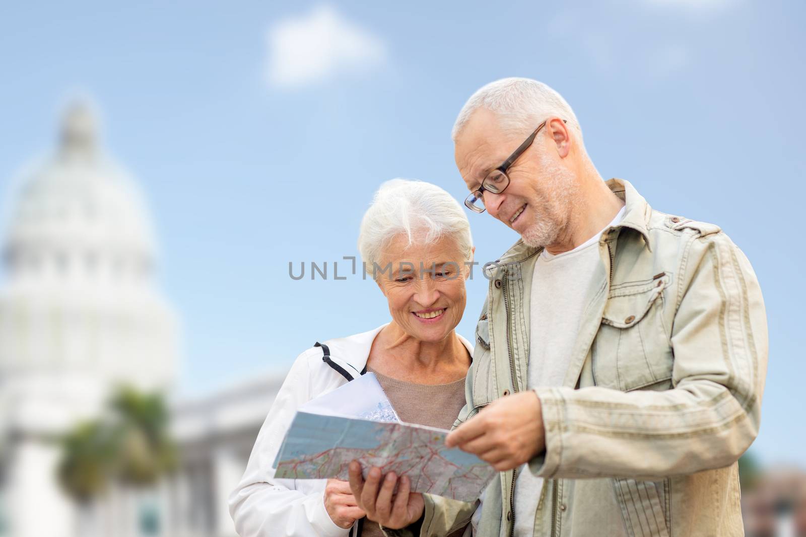 family, age, tourism, travel and people concept - happy senior couple with map over washington white house background