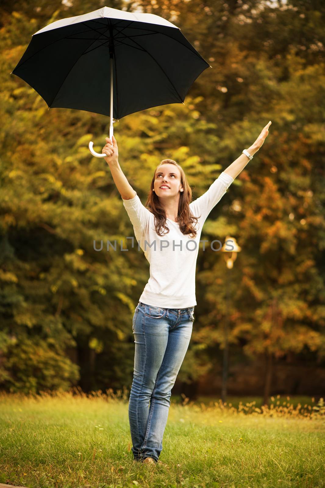 Young Woman With Umbrella by MilanMarkovic78