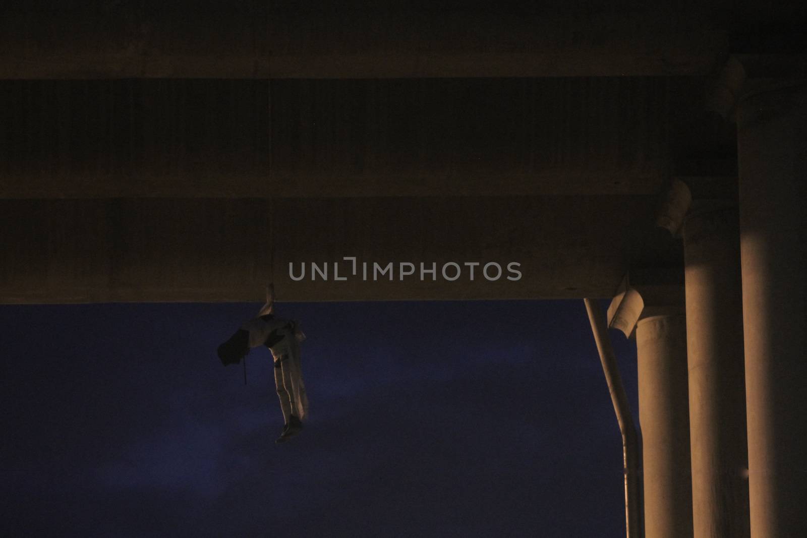 [Warning: graphic content]MEXICO, Iztapalapa: A dead man hangs from the Puente La Concordia, a bridge in Iztapalapa, Federal District, Mexico City, Mexico on October 19, 2015. The victim, reportedly close to age 30, was found with his head and body wrapped, and showed signs of torture when he was discovered around 4am local time. While the man's death is still being investigated, Iztapalapa has been listed among the most dangerous neighborhoods in the world.