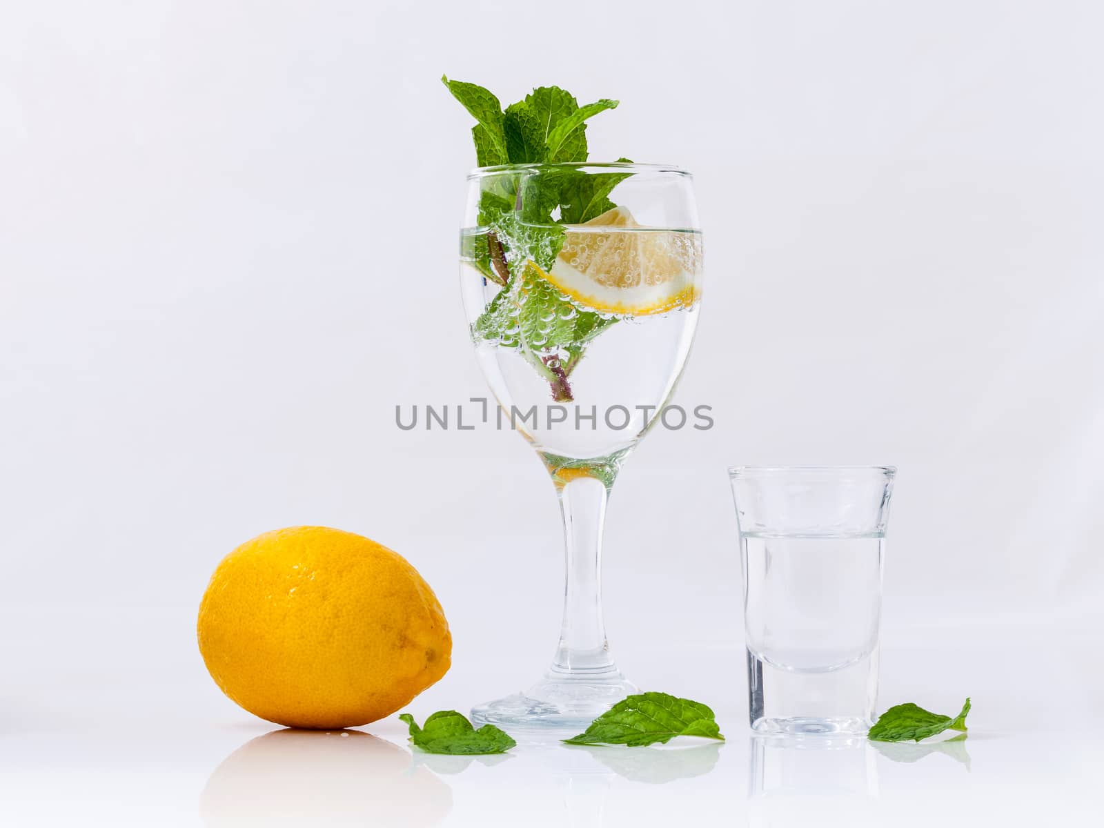 Mojito cocktail with fresh mint leaves isolate  on white backgro by kerdkanno