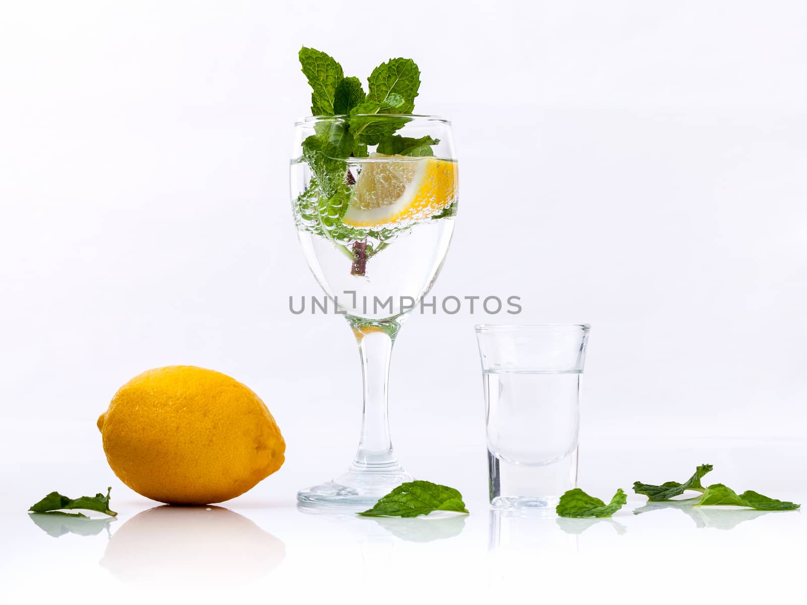 Mojito cocktail with fresh mint leaves isolate  on white background.