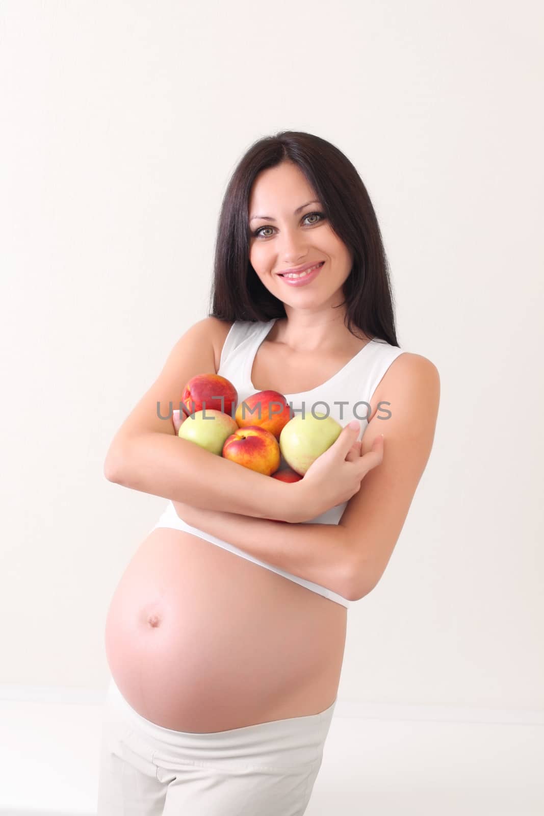 pregnant woman with fruits by rudchenko