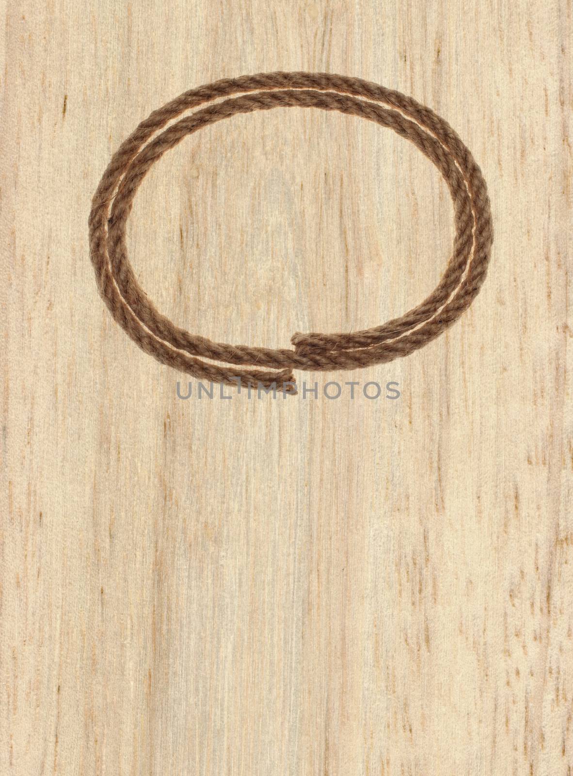 rope frame on wood background