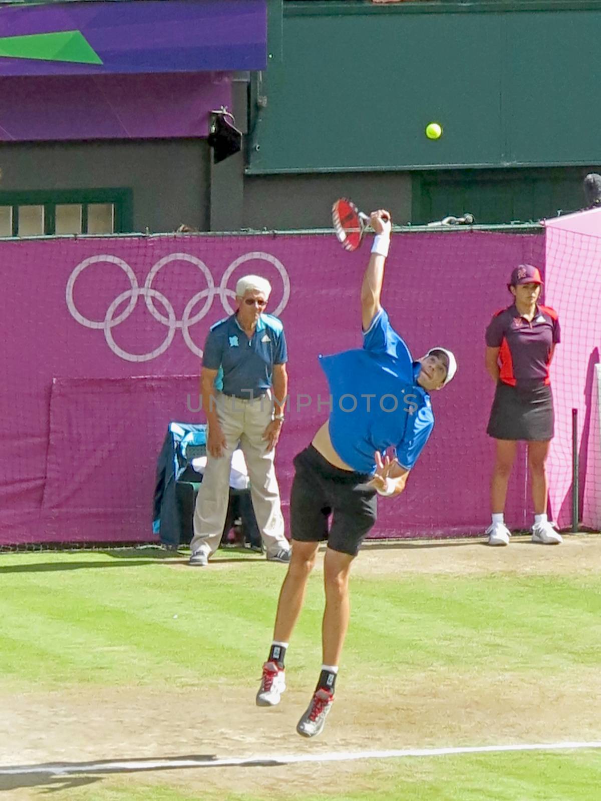 WIMBLEDON, ENGLAND - August 2nd, 2012 - John Isner during one of his singles matches at the summer Olympics in London in 2012. He made it to the quarterfinals in the tournament.