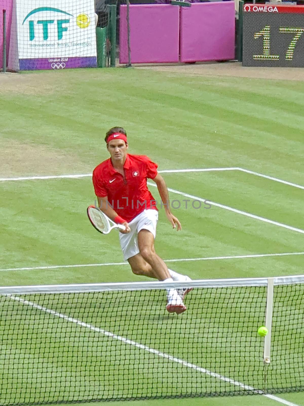 WIMBLEDON, ENGLAND - August 2nd, 2012 - Roger Federer during one of his singles matches at the summer Olympics in London in 2012. He came 2nd and won the silver medal in the tournament.