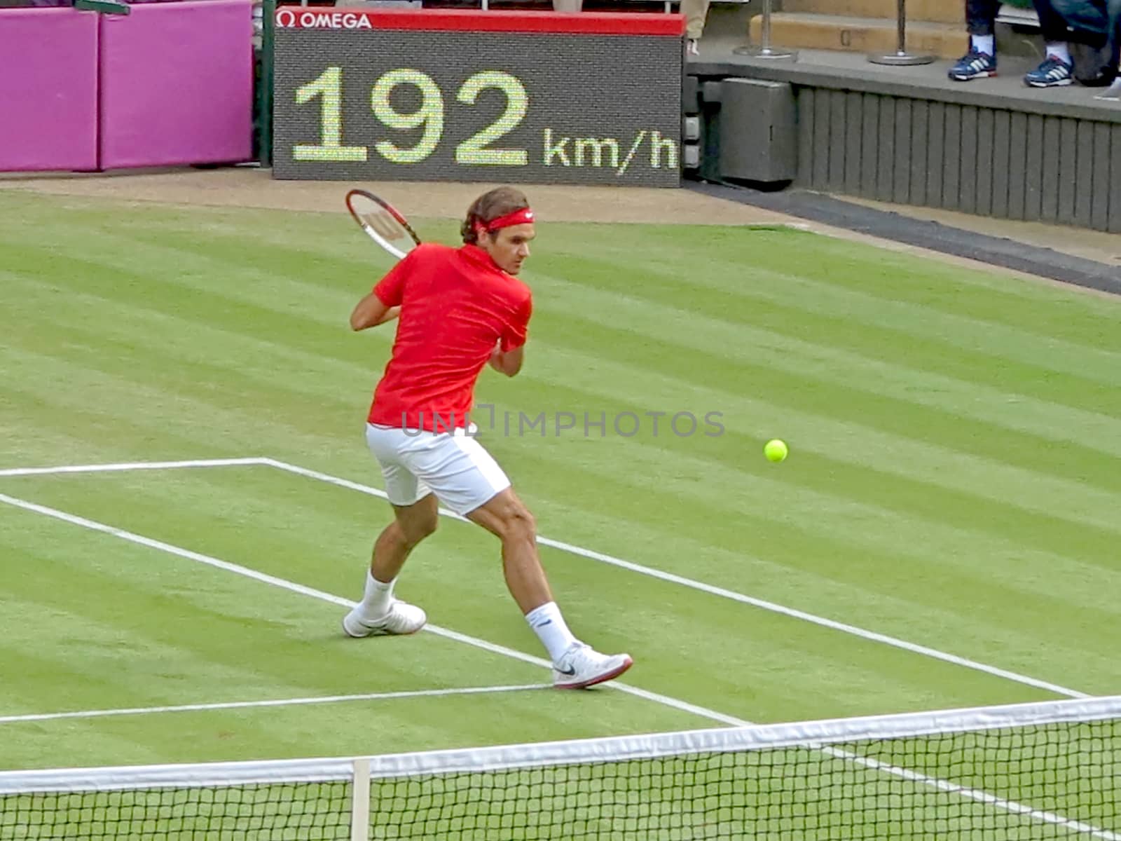 WIMBLEDON, ENGLAND - August 2nd, 2012 - Roger Federer during one of his singles matches at the summer Olympics in London in 2012. He came 2nd and won the silver medal in the tournament.