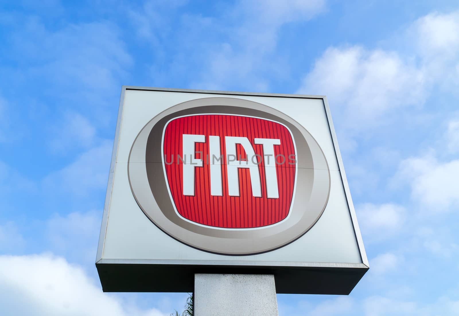 COSTA MESA, CA/USA - OCTOBER 17, 2015: Fiat automobile dealership sign. Fiat is an Italian manufacturer of automobiles and commerical vehicles.