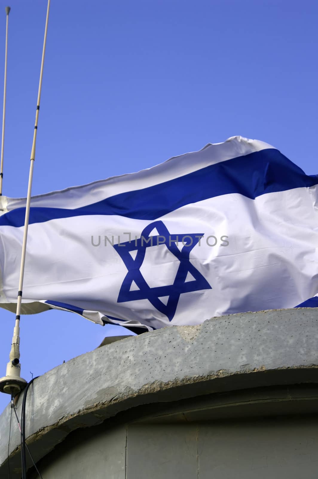 Israel state flag on an army post