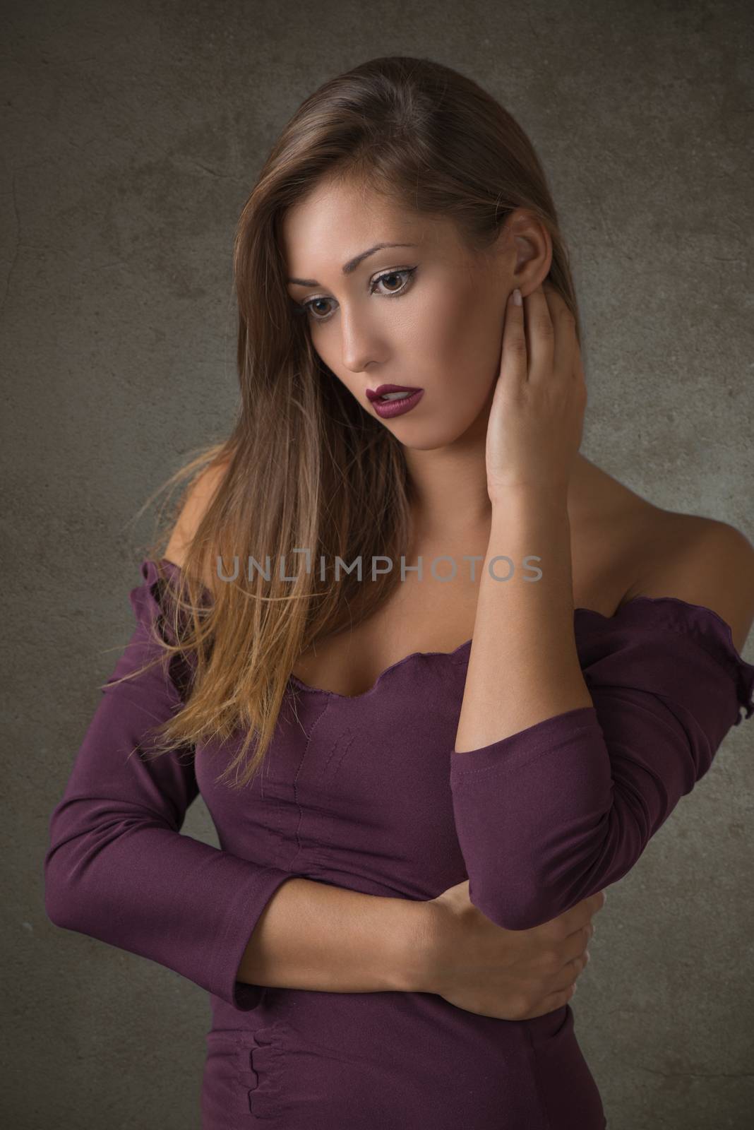 Portrait of an attractive and loneliness young woman posing and thinking.