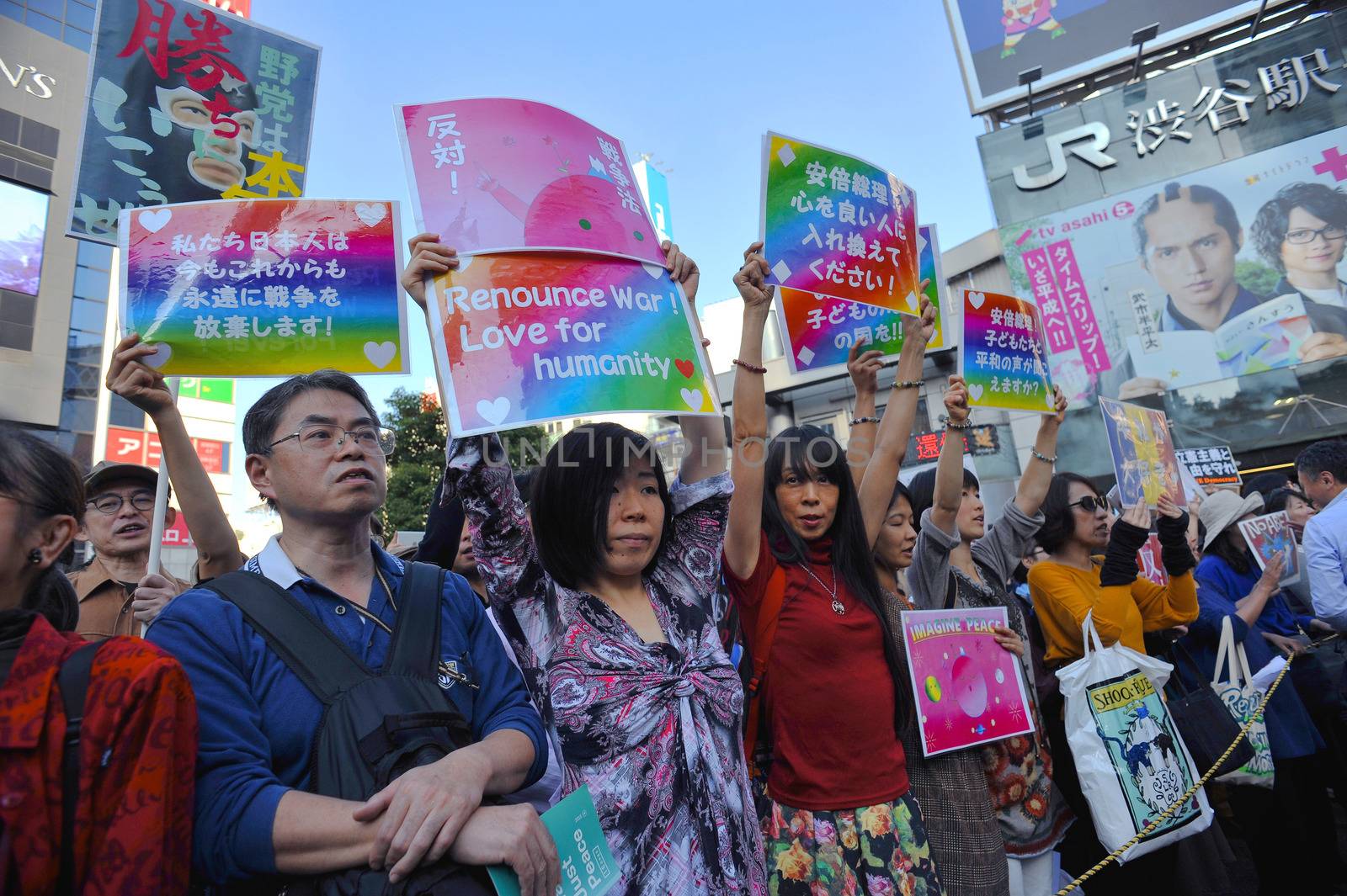 JAPAN, Tokyo : Thousands of people protest in Tokyo outside of Japan's parliament against new legislation that would allow the military to deploy overseas on October 19, 2015. The changes would allow Japanese troops to fight abroad for the first time since World War Two.