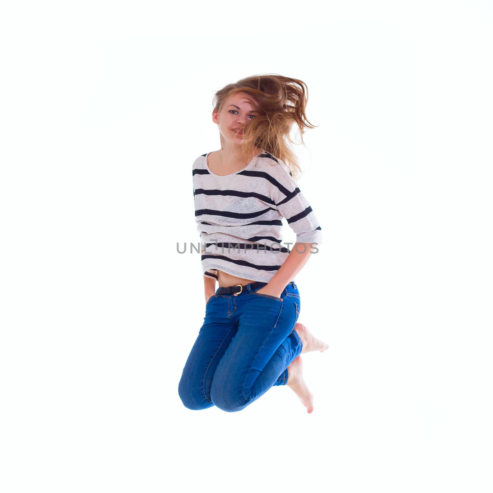 smiling  girl in white blank t-shirt jumping by victosha