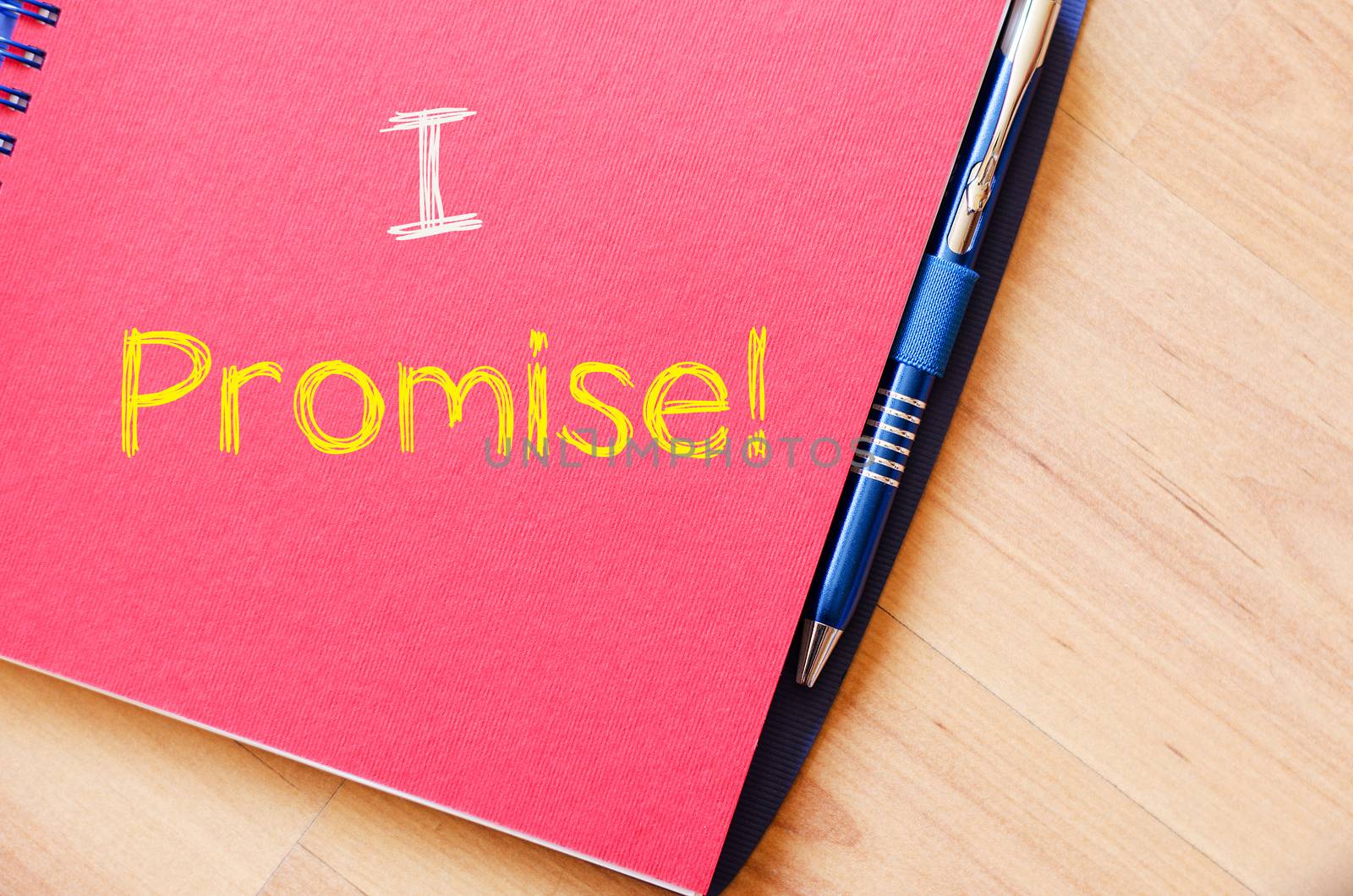 I promise text concept write on notebook