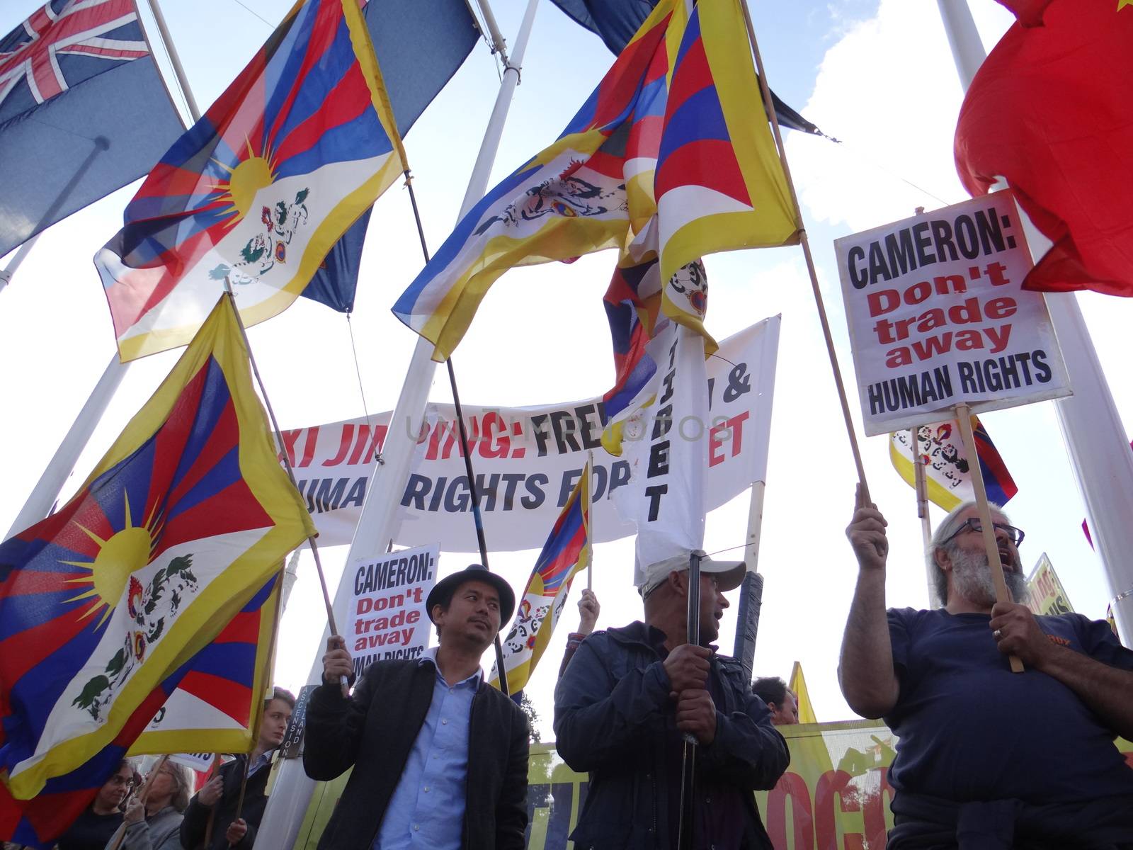 UK, London: Dozens of pro-Tibet protesters rally outside Parliament in London, England on October 20, 2015, as Chinese President Xi Jinping arrives for his address during his four-day visit. Since China's invasion of their country in 1950, Tibetans have never stopped resisting the occupation, and claiming the destruction of their way of life.
