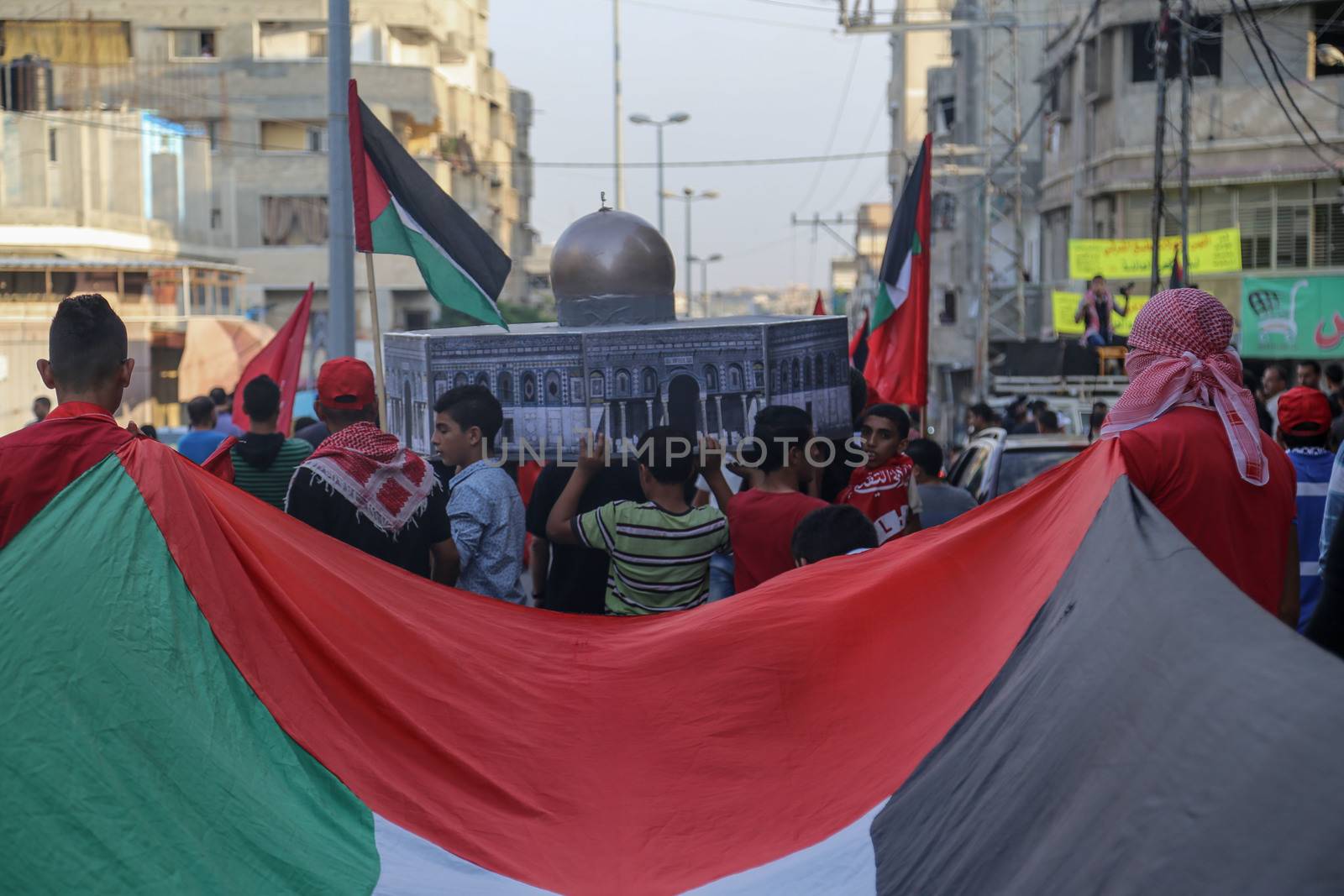 GAZA, Gaza City: Members of the Popular Front for the Liberation of Palestine participate in a protest in Gaza on October 20, 2015. The group is rallying against what it perceives to be Israeli aggression in Jerusalem, the occupied West Bank and Gaza region over the past month, during which an upsurge of violence, including stabbing and gun attacks, has led to the deaths of at least 37 Palestinians and seven Israelis.   