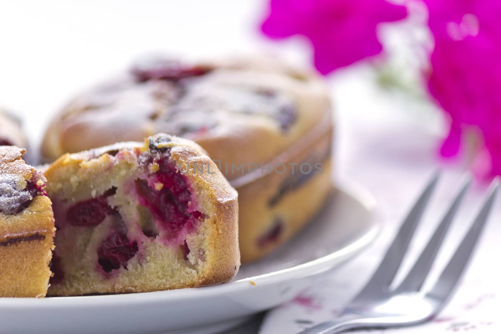 Freshly prepared cake with cherry