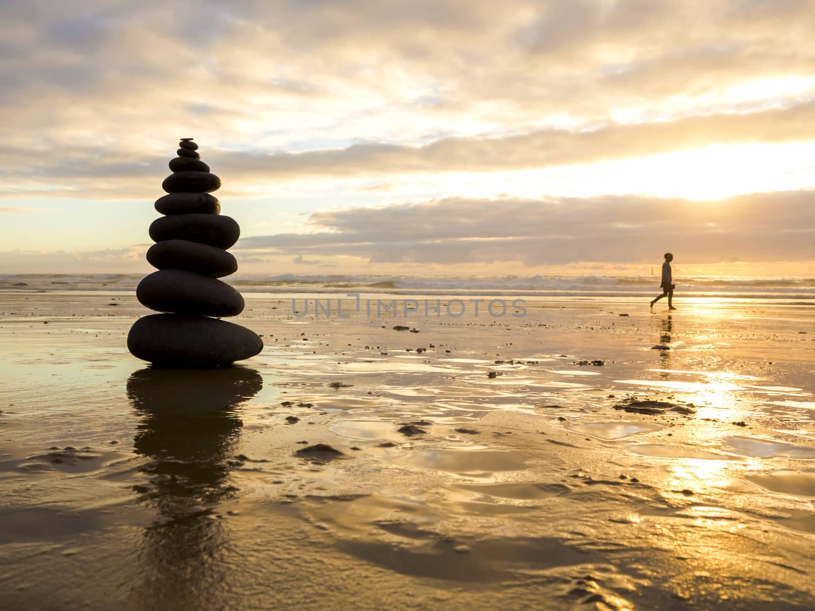 Sea stones stacked on the beach