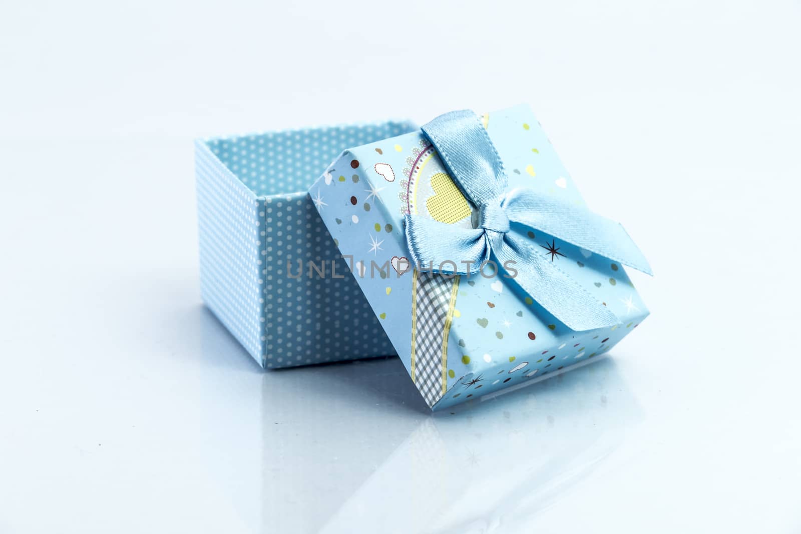 gift box isolated on white background by teerawit