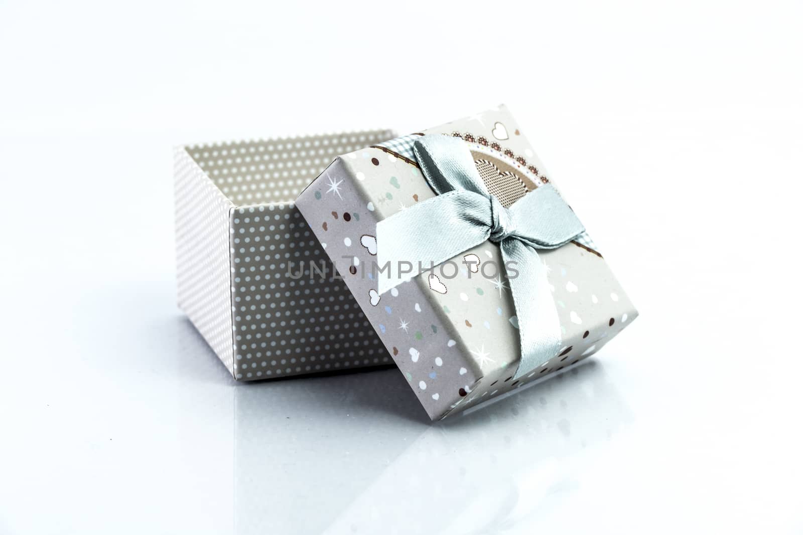 gift box isolated on white background by teerawit