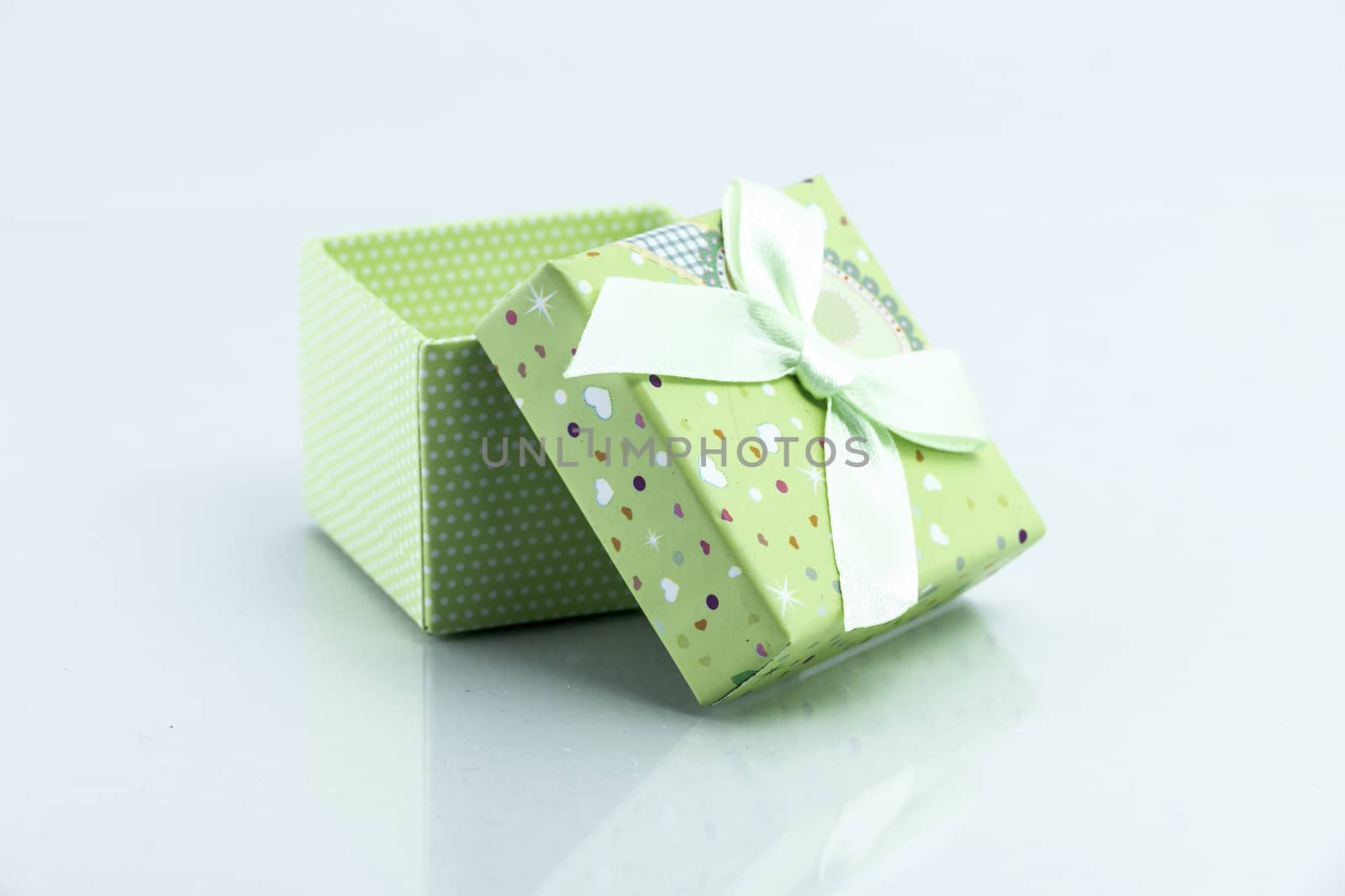 gift box isolated on white background by teerawit