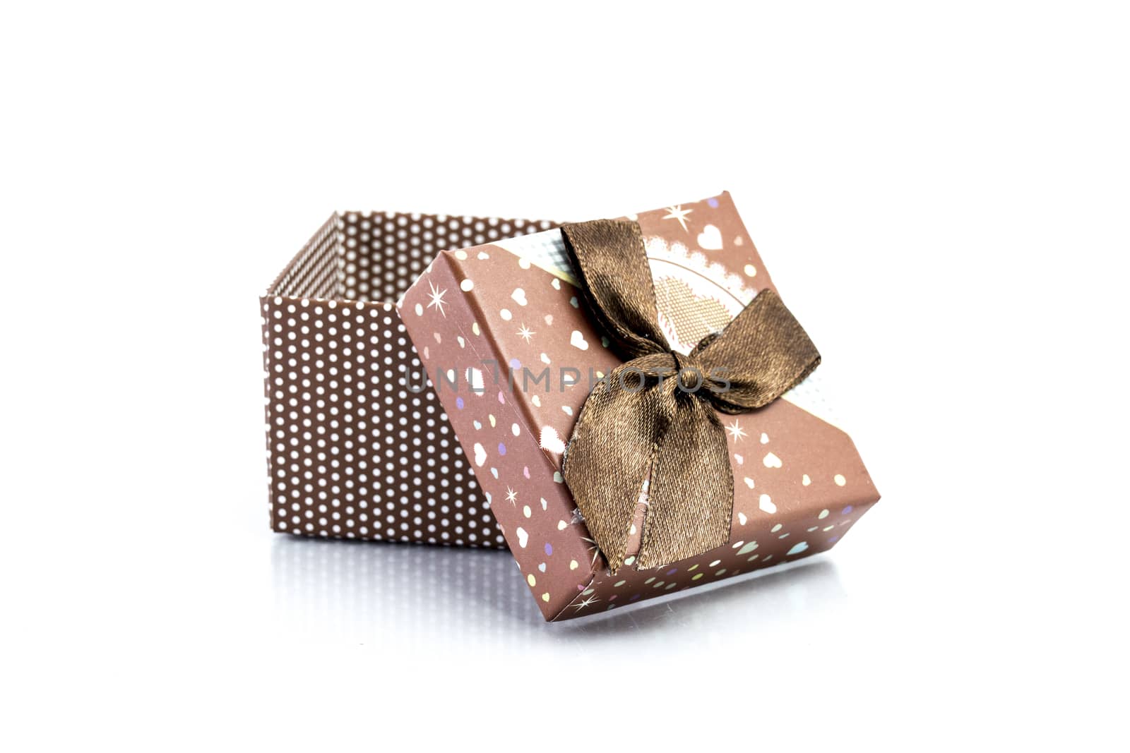 gift box isolated on white background by teerawit