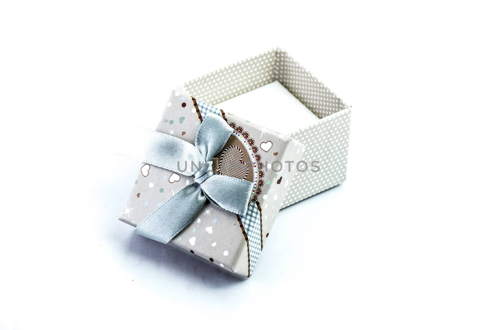 gift box isolated on white background by teerawit