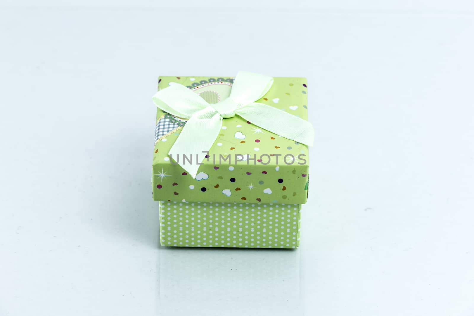 gift box isolated on white background by teerawit