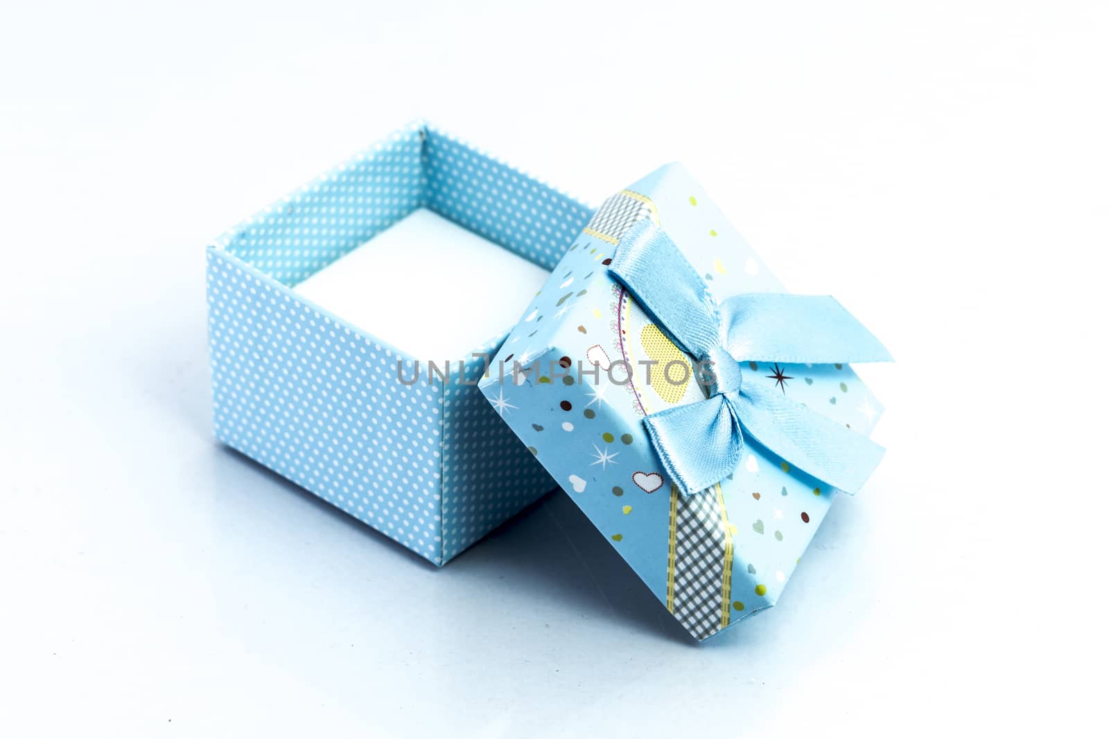 gift box isolated on white background by teerawit