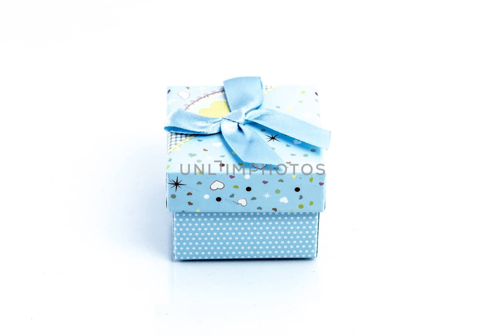 gift box isolated on white background by teerawit