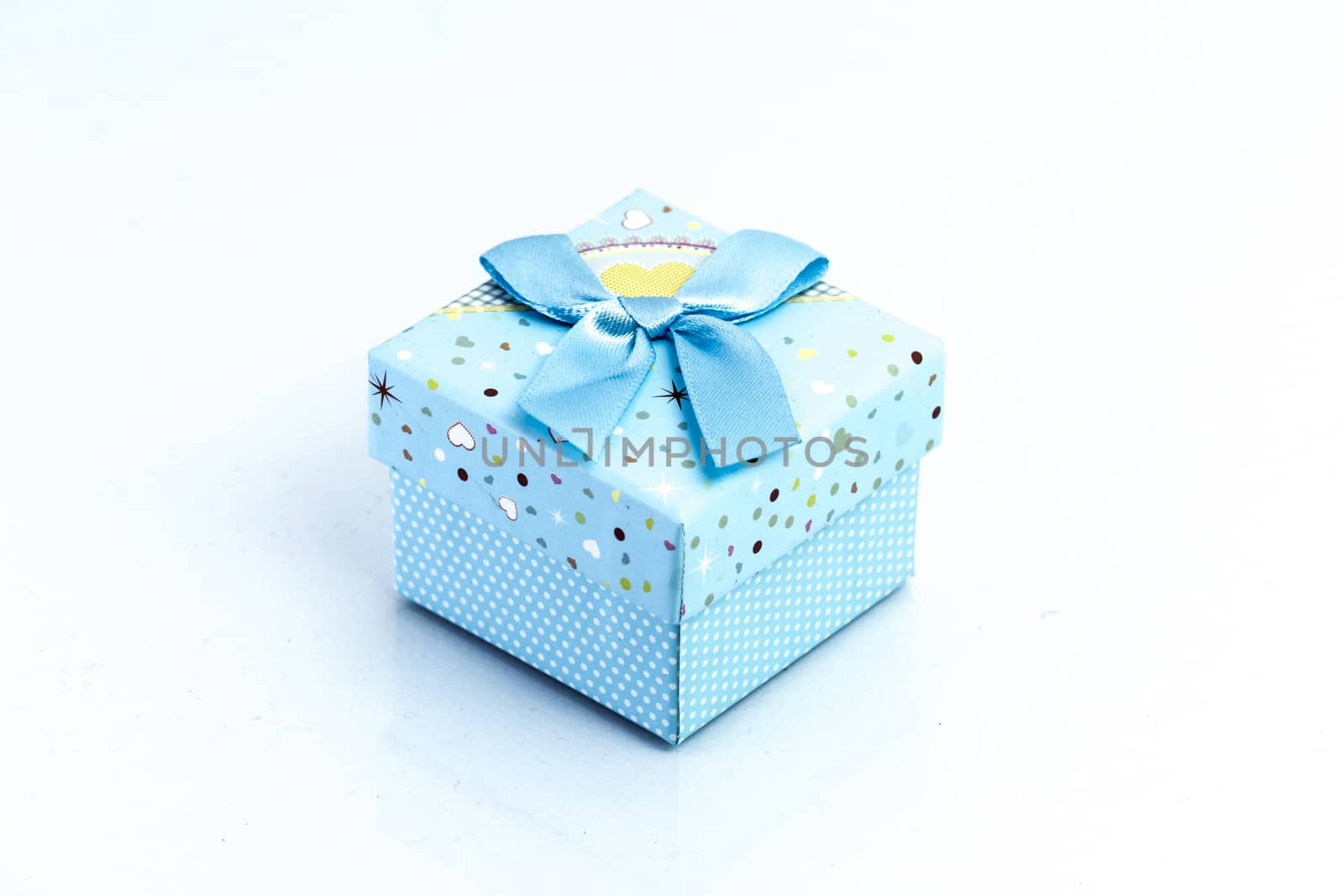 gift box isolated on white background by teerawit