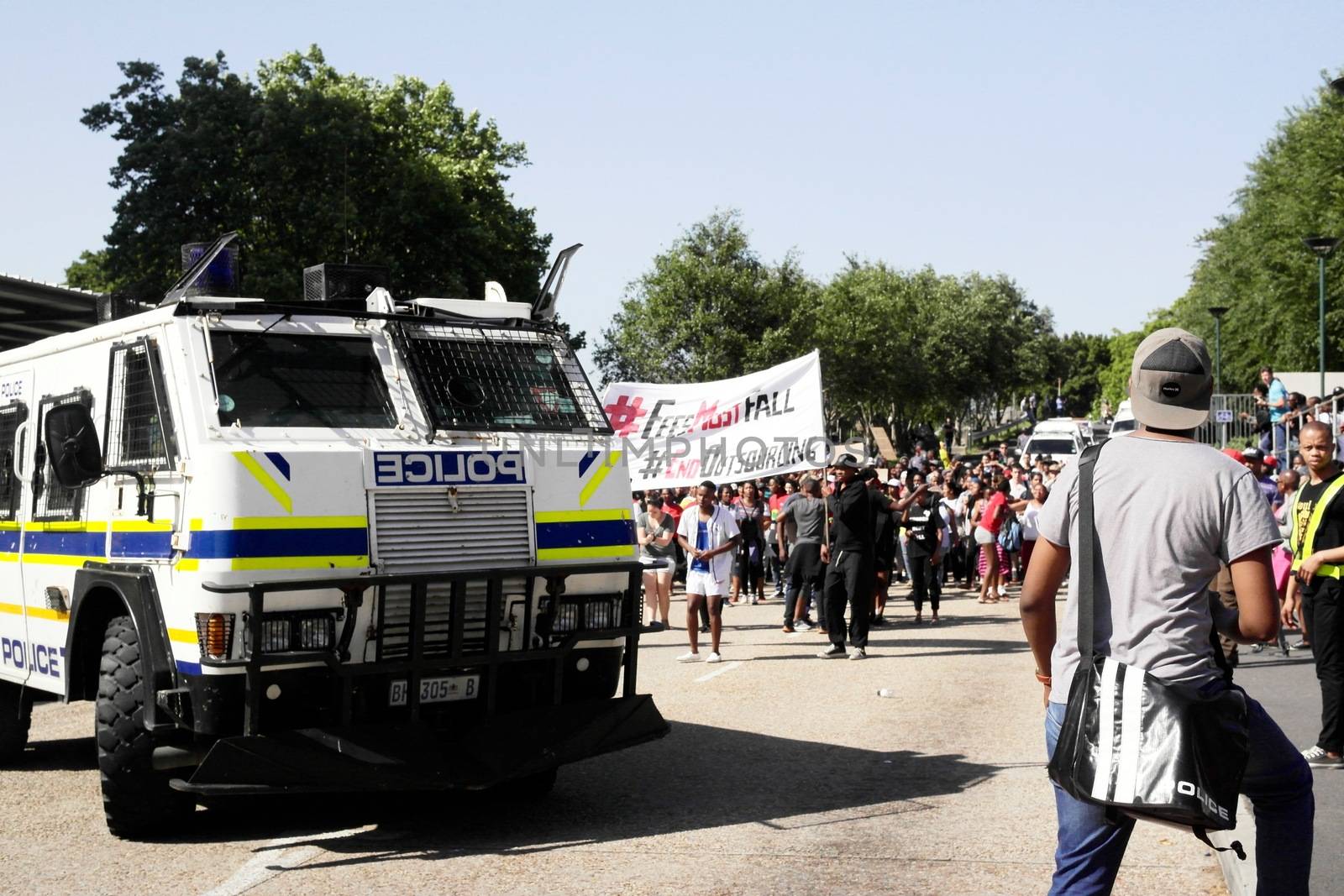 SOUTH AFRICA, Cape Town : Students rally during a protest against fee hikes at the University of Cape Town on October 20, 2015. Student protests halted teaching at three of South Africa's top universities on October 19 as demonstrations spread against fee increases that many say will force poor black students further out of the education system