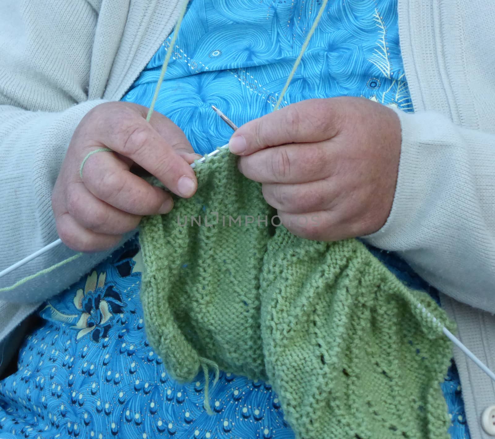 Senior woman knitting