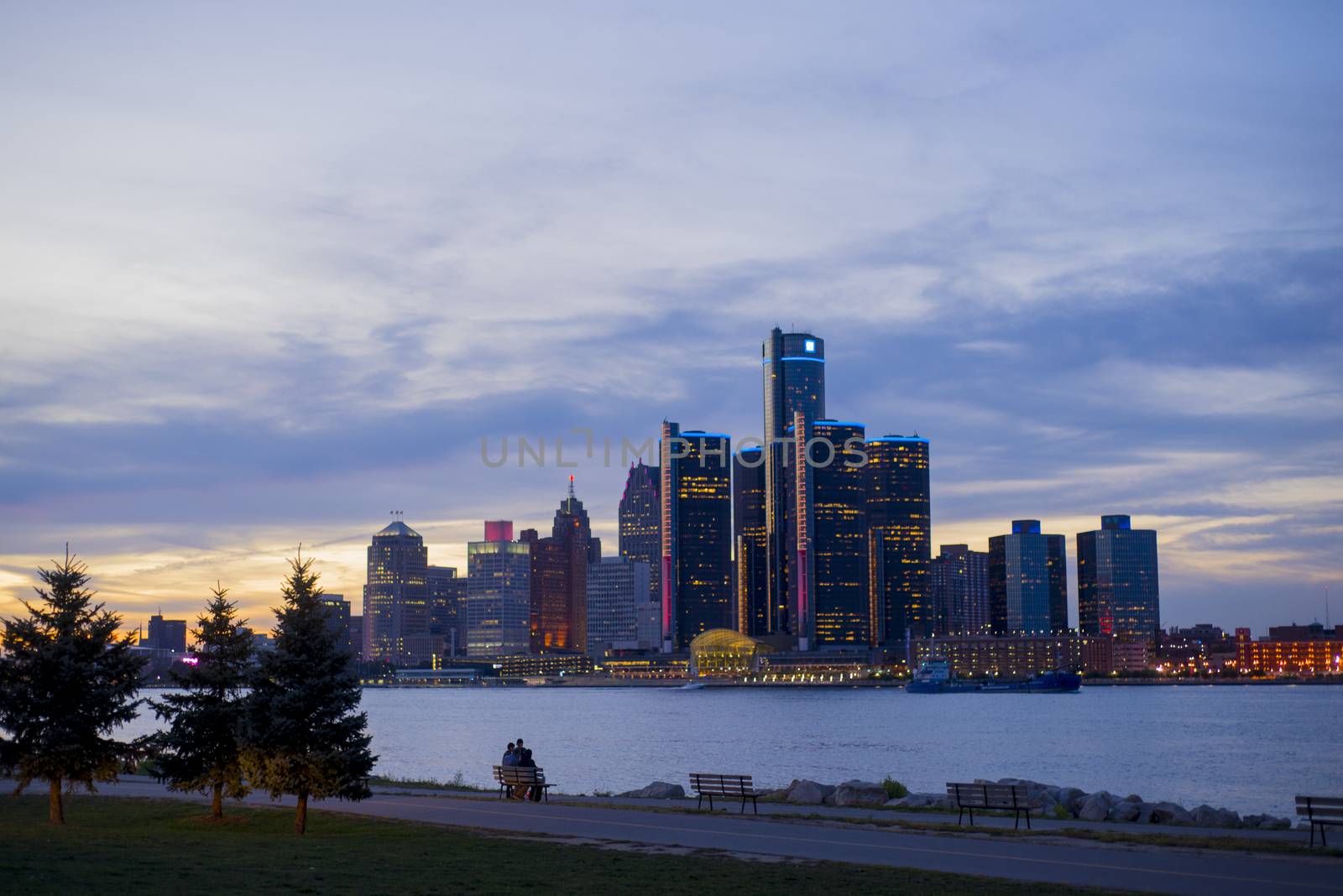 DETROIT, MI-SEPTEMBER, 2015: A view of Detroit skyline with the world headquarters for General Motors Corporation, situated along the Detroit River. Taken at sunset from Windsor, Ontario.