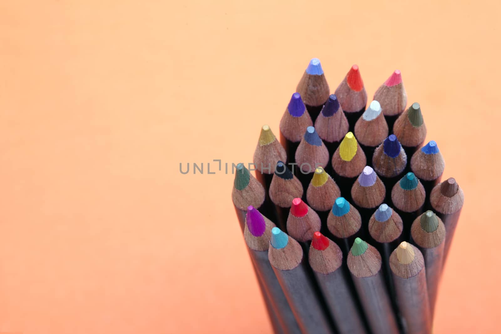 Colored pencils on background by rudchenko