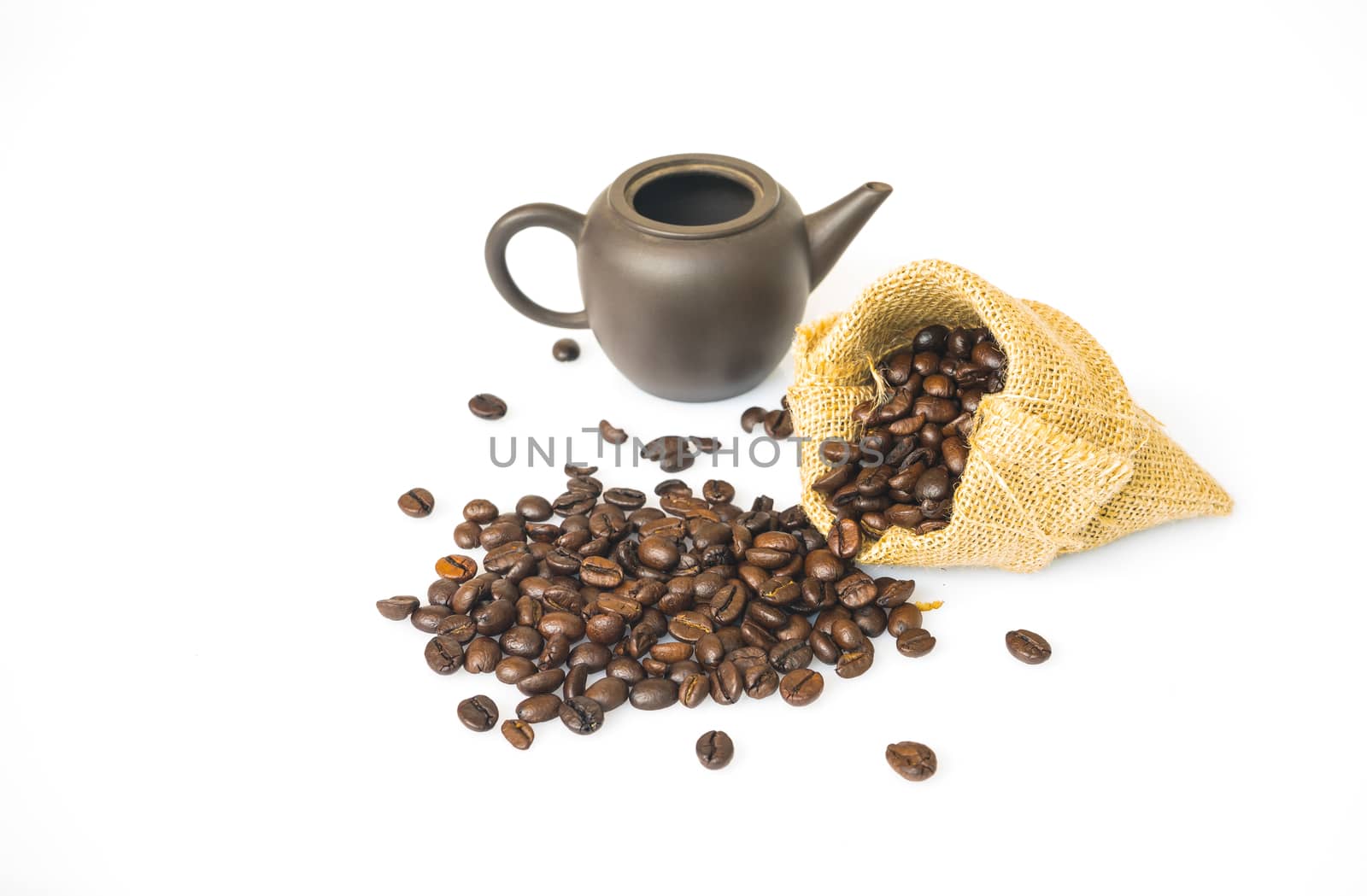 Coffee beans on a sack with Ancient pots on a white background.