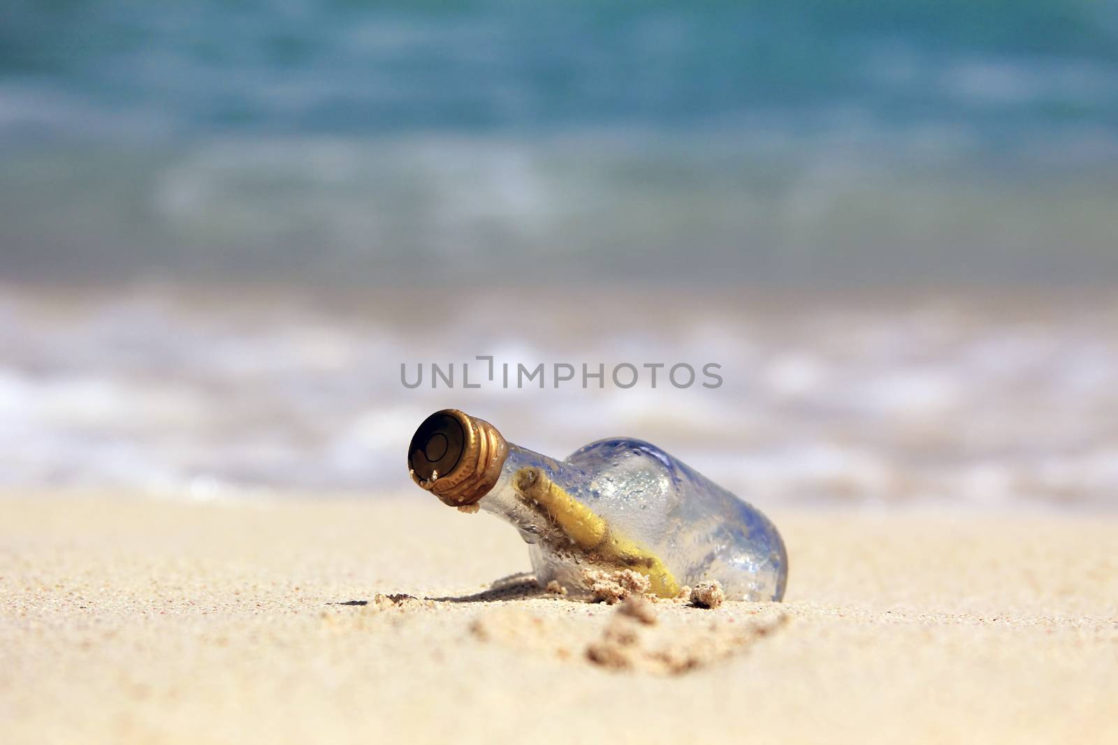 Message in the bottle on blue background